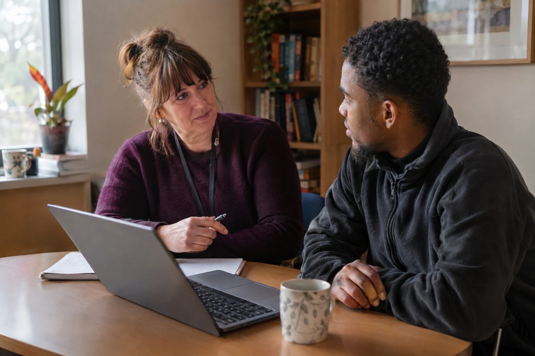 A manager and a support worker in a supervision conversation